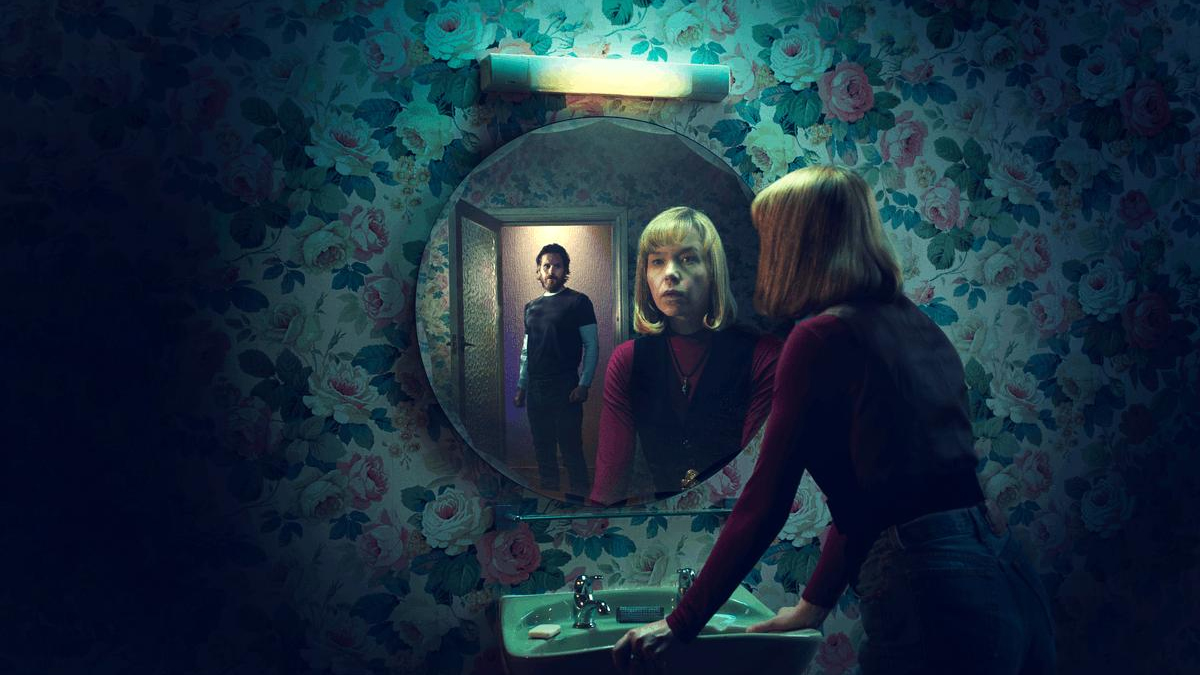 Anna Maxwell-Martin as Delia Balmer looking into a mirror in ITV drama Until I Kill You