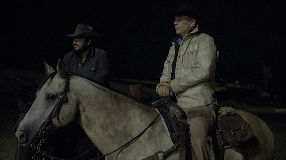 John Dutton (Kevin Costner) on a horse at night in Yellowstone season 5.