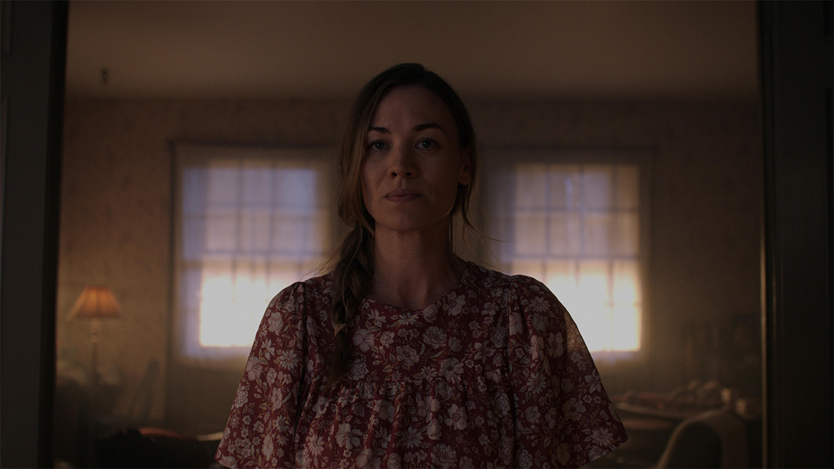 Serena Joy in The Handmaid's Tale season 6 wearing a pink floral blouse