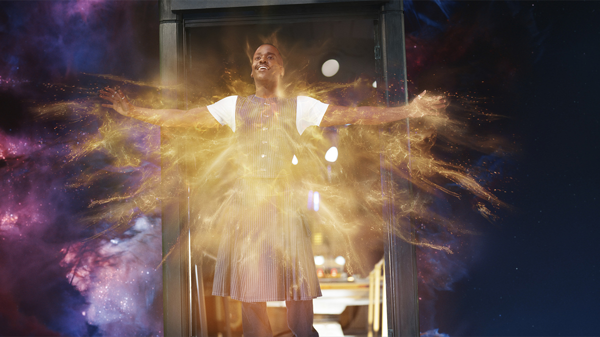 Ncuti Gatwa as the Fifteenth Doctor standing in the TARDIS doorway emitting regeneration energy